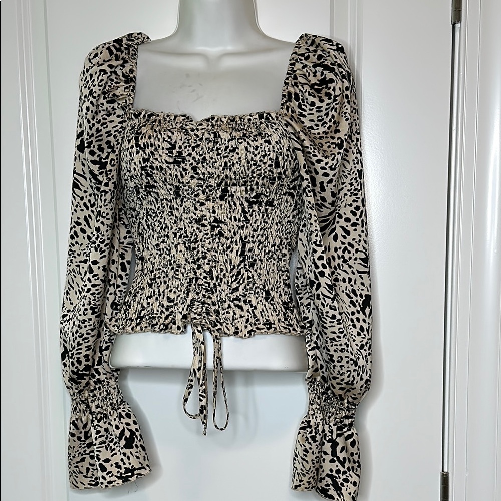 Black and White Smocked Blouse with Long Sleeves and Tie Front